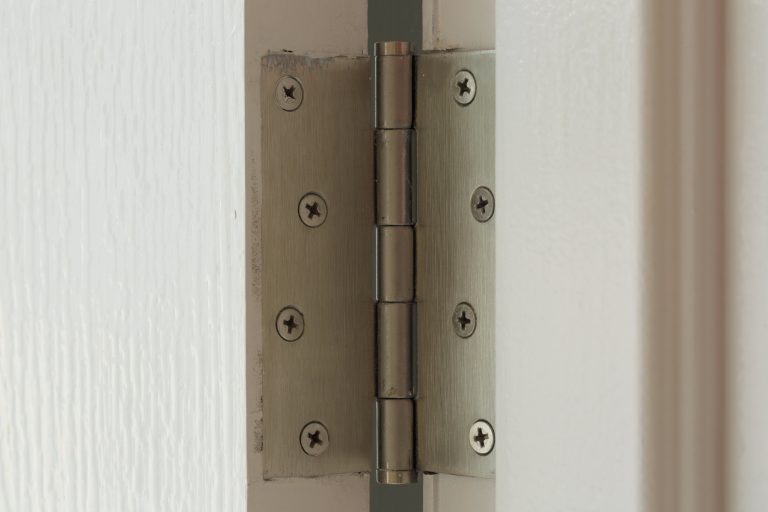 When should I replace my door hinges?